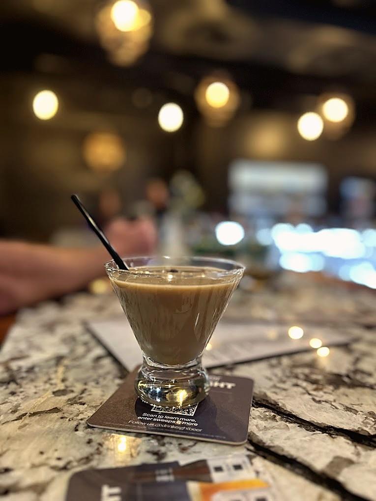 An espresso martini on the marble bar inside the lounge